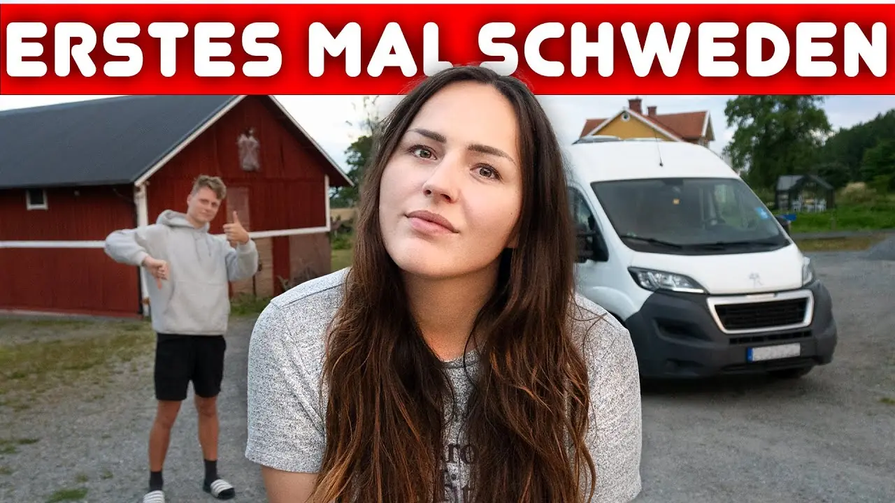 Mark und Lara von Lehmann Vlogs vor ihrem weißen Kastenwagen an einem roten Holzhaus in Schweden, Video Erstes Mal Schweden